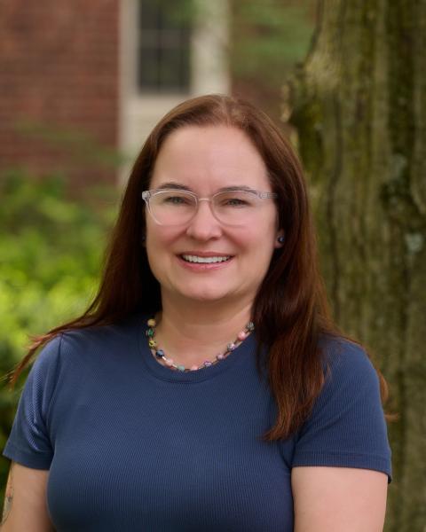 Assistant Director for New Student Orientation and Student Engagement Tanja St. Pierre standing facing camera.