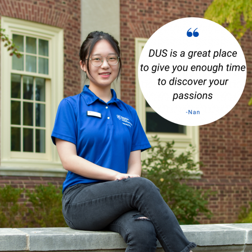 Nan, a member of DUS Leadership Council, sits on a bench outside of Grange Building. 