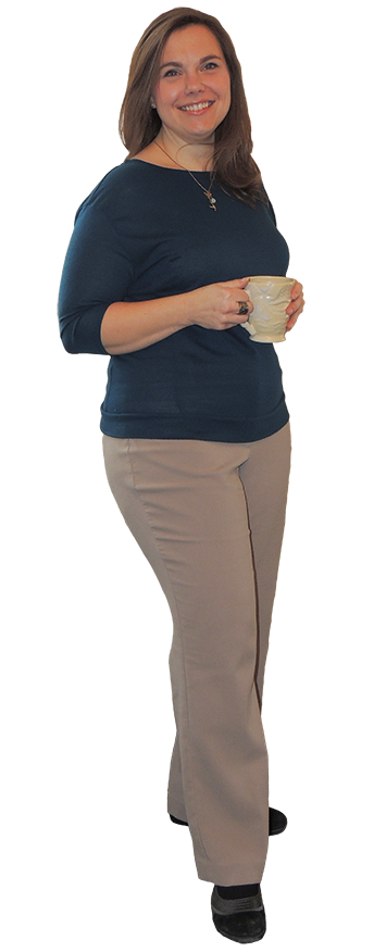 Janet Schulenberg, a white woman, smiling and holding a coffee mug